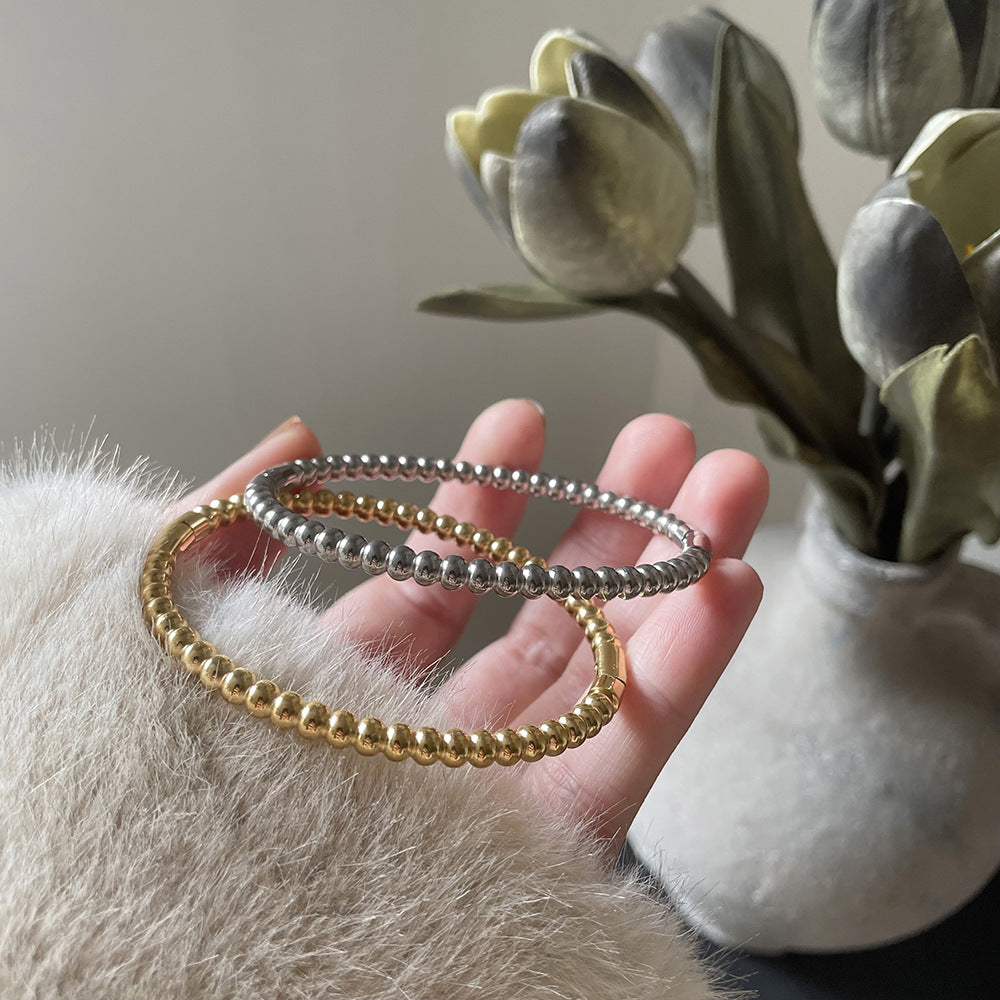 SZ018 Bracelet minimaliste à perles dorées avec revêtement en titane