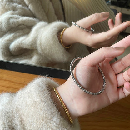 SZ018 Bracelet minimaliste à perles dorées avec revêtement en titane